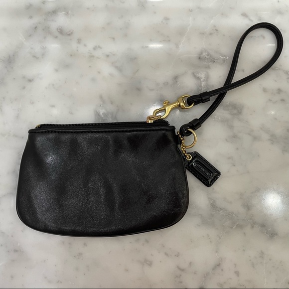 Coach Wristlet. Black Leather. Purple satin liner inside. Excellent condition. - Picture 2 of 3